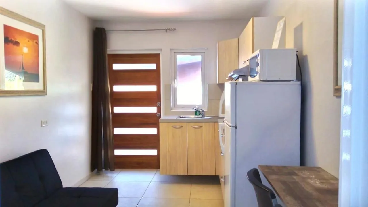 Rooi Santo Residence Palm Beach Apartment